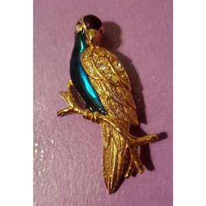 AVON 1994 GREEN and PURPLE ENAMEL RHINESTONE TROPICAL BIRD GOLD COLOR PIN -2.5"